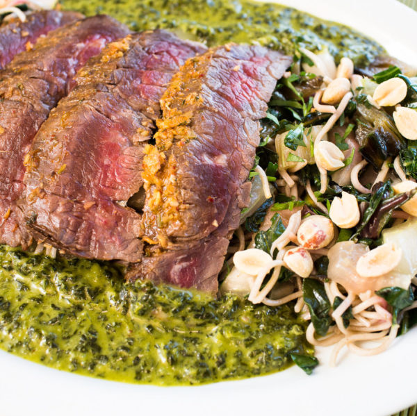 Sweet & Spicy Allstad Farm Skirt Steak w' Cilantro Mint Mojo & Roasted Peanuts over hearty greens stir fry