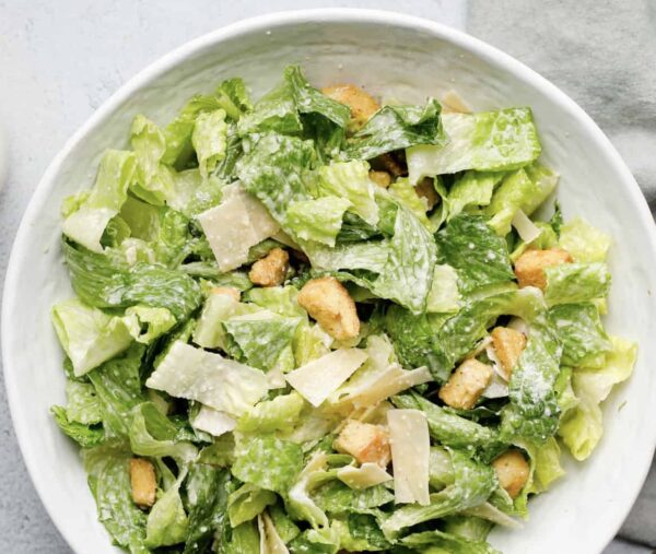 Caesar Salad w' Roasted Garlic Croutons & Shaved Parmesan Garnish