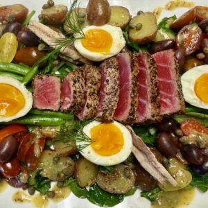 Pepper Seared Ahi Tuna Nicoise Salad w' soft boiled eggs, tomatoes, green beans baby potatoes & summer greens, wild white anchovies (optional)